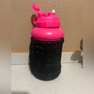 Hydro Jug with black cheetah print sleeve and straw